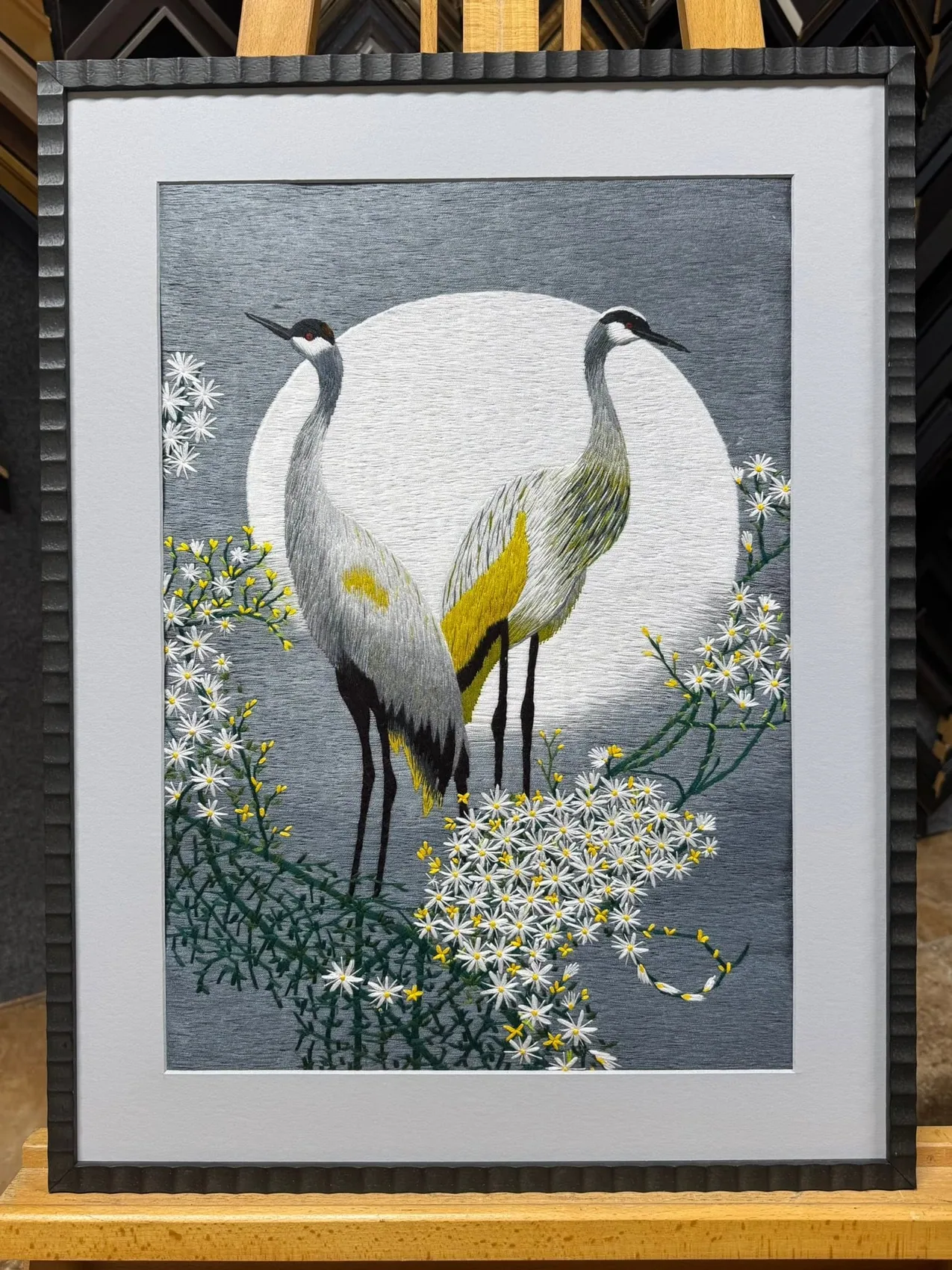 Framed crane artwork